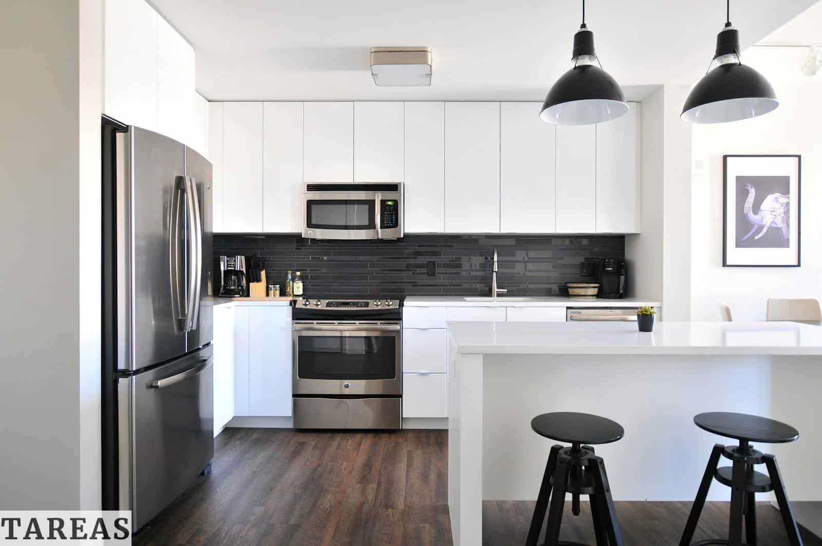 gray steel 3-door refrigerator near modular kitchen