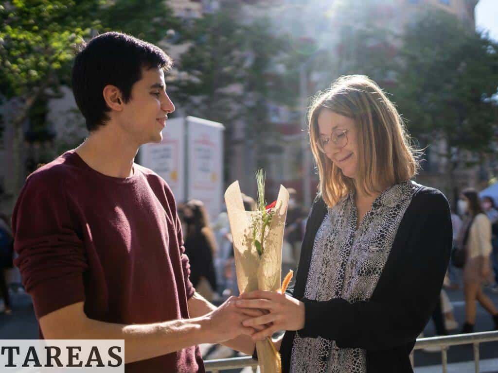 A Man Giving a Red Rose to His Woman